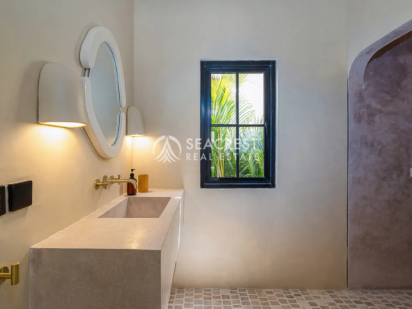 Sunny terrace with seating and umbrellaPrime Location with Strong Rental Potential